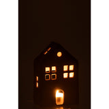 Porte-bougie Huis Agra sur une table moderne