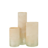 Vase J-Cylindre en verre beige, sur une table
