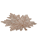 Mise en scène du set de table J-Line Feuille sur une table décorée