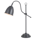 Détail de la finition en métal gris de la table Näve Leuchten