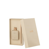 Détails de l'huile parfumée J-Line en couleur beige
