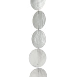 Détail de la branche J-Line en rotin avec fleurs séchées, style bohème.