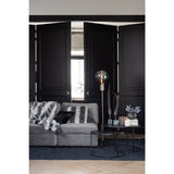 Coussin J-Line noir en situation dans un salon moderne