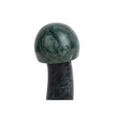 Détail de la texture marbrée de la statue champignon, couleur verte