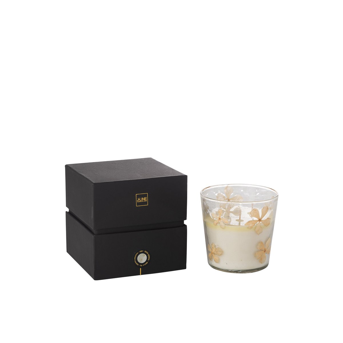 Détail de la bougie parfumée J-Line Fleurs avec une ambiance chaleureuse