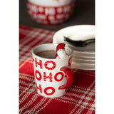 Mug Père Noël J-Line sur une table décorée pour Noël