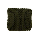 Coussin J-Line tricoté vert sur canapé, ambiance cosy