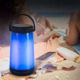 Lumière de table LED avec haut-parleur BT "Festa" pour zone extérieure en plastique noir avec des LED intégrées, 18 cm de haut