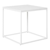 Table d'appoint Vita blanche avec design minimaliste dans un salon moderne