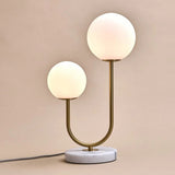 Lampe à poser en marbre blanc et métal doré