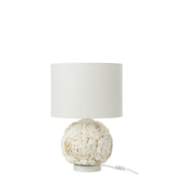 Vue latérale de la lampe J-Line Schelp Small, ambiance chaleureuse