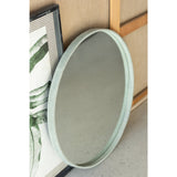 Miroir J-Line Round sur fond neutre, mettant en valeur son design