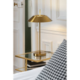 Vue latérale de la lampe de table J-Line en métal doré.