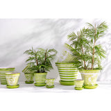 Pot de fleurs J-Line Granada Stripes sur une table en bois
