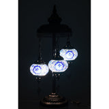Lampe Mosaïque 3 Ampoules sur une table, ambiance intérieure.