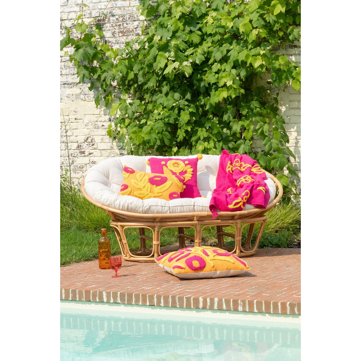 Détail du plaid Fleurs avec motifs floraux colorés