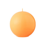 Bougie Boule J-Line en cire fluo orange, vue de face