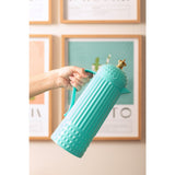 Détail du capuchon couronne dorée du thermos
