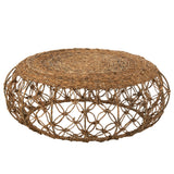 Table basse Soucoupe J-Line entourée d'éléments décoratifs