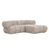 Détail du revêtement en tissu beige du canapé New York