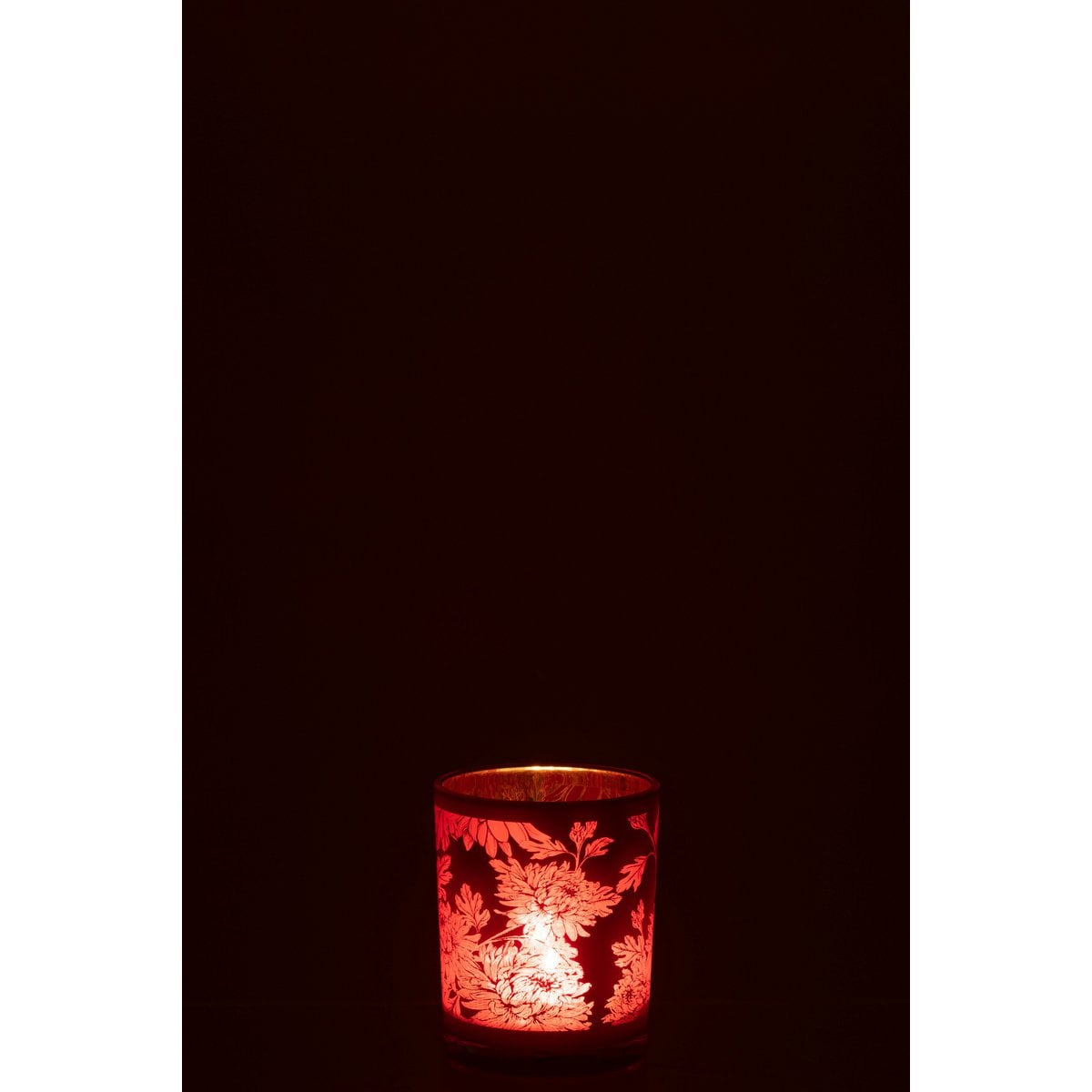 Détail de la lanterne J-Line en verre rouge, ambiance chaleureuse