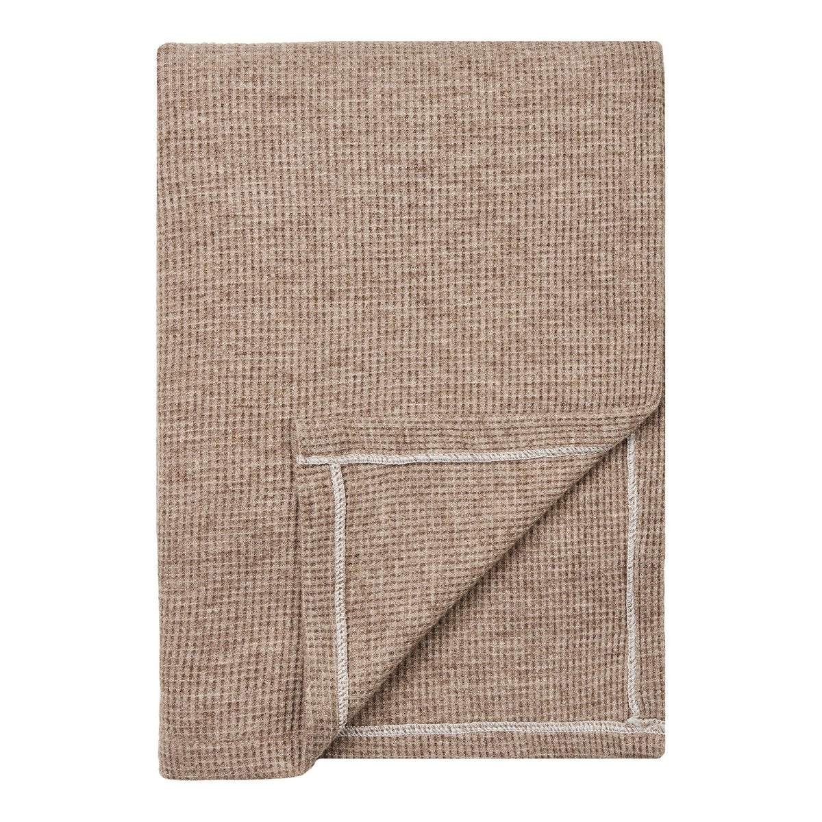 Plaid Puno taupe sur canapé, ambiance scandinave