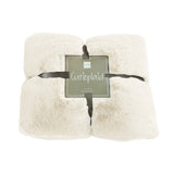Plaid Cutie en polaire blanc dans un salon moderne