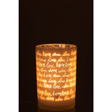 Photophore J-Line Love sur une table moderne