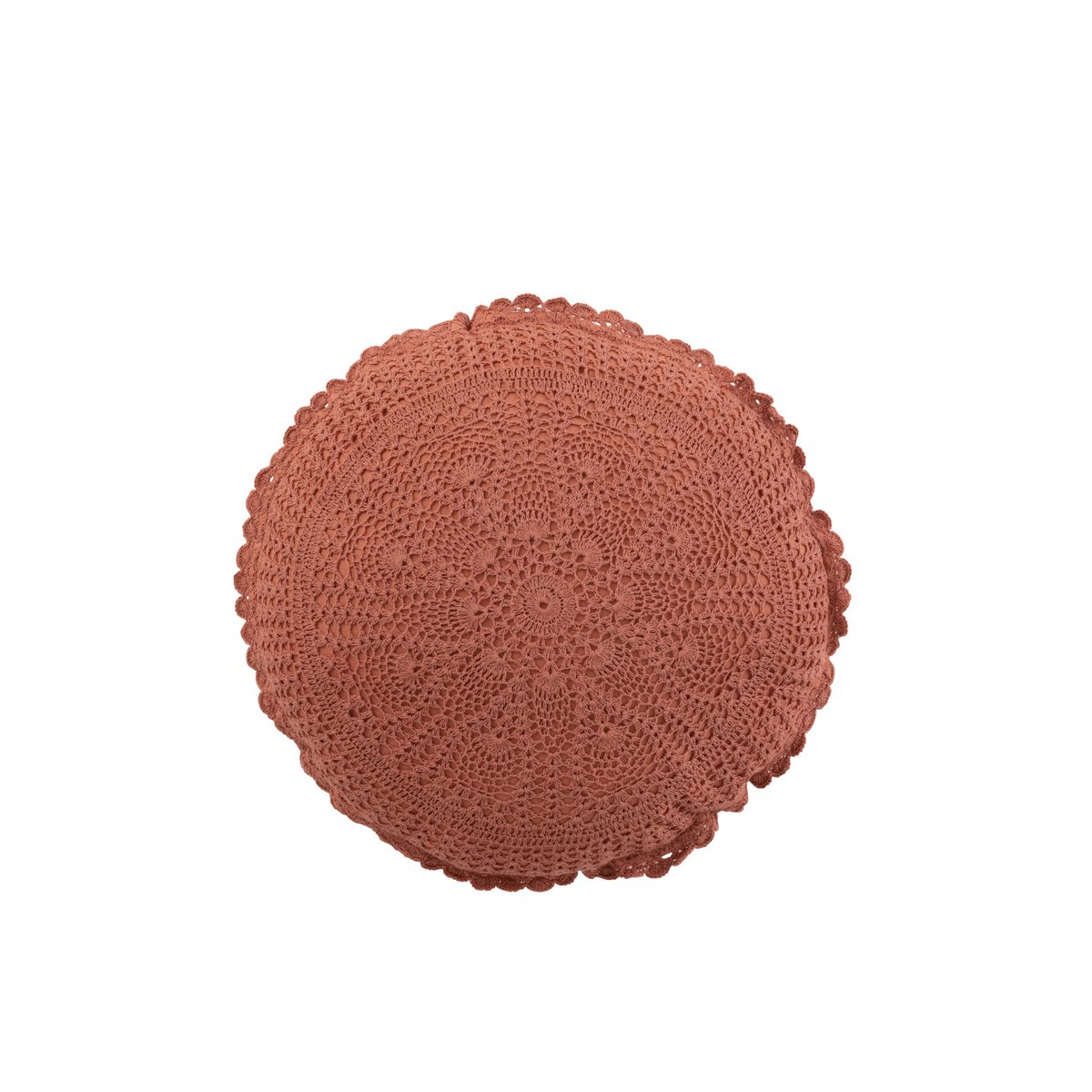 Coussin rond Mia Kant sur un canapé, créant une ambiance chaleureuse