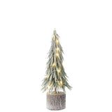 Sapin de Noël A+Led J-Line sur un fond de décor festif