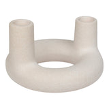 Bougeoir en céramique beige, avec une bougie allumée pour ambiance chaleureuse