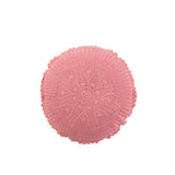 Coussin rond Mia Kant rose, intégré dans un salon moderne