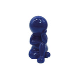 Statue Amigo Rêveur en polyresine bleue sur fond blanc