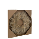 Détail de la couronne J-Line, mettant en valeur les textures du rotin naturel.