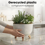 Vue latérale de la jardinière Doppio en plastique recyclé