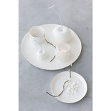 Photophore J-Line blanc dans un salon moderne