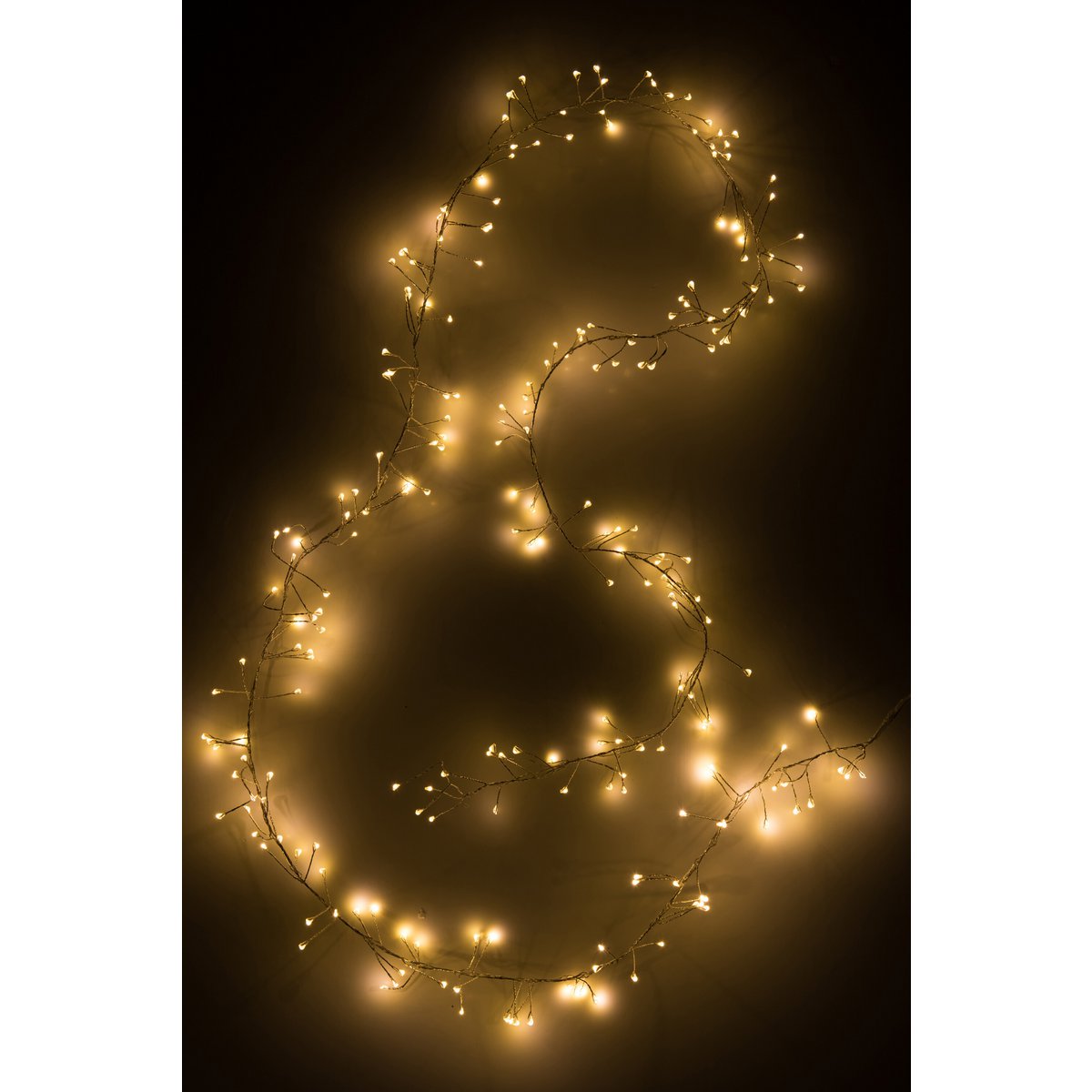 Détail de la branche lumineuse J-Line, texture plastique blanc