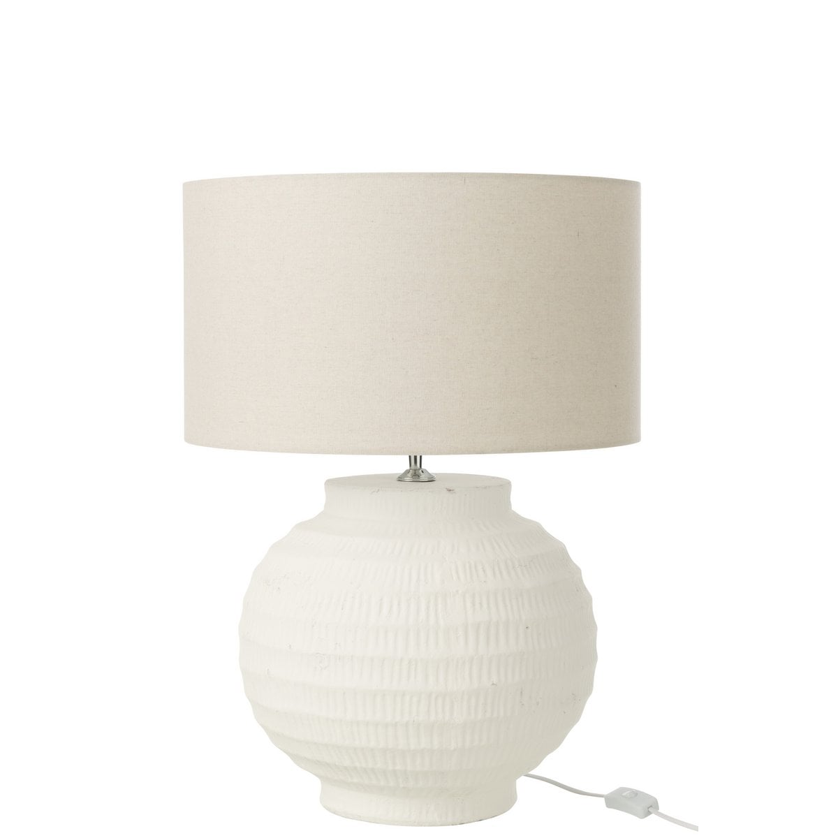 Lampe J-Line sur une table de chevet