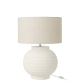 Lampe J-Line sur une table de chevet