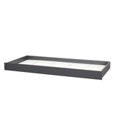 Vue latérale du tiroir de lit gris, style scandinave
