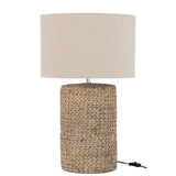 Lampe J-Ligne Dik Tresse dans un salon moderne, ambiance chaleureuse