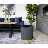 Détail du Pouf Gamby montrant le velours noir et la base en laiton