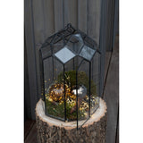 Vue rapprochée du terrarium J-Line, mettant en valeur le verre transparent