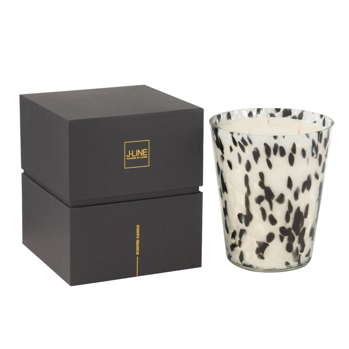 Vue de la bougie J-Line Noa sur une table décorée, ajoutant une touche de luxe.