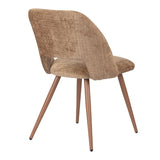 Chaise d'arc caramel sur un fond neutre, mettant en valeur le tissu