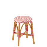 Tabouret en rotin rose, angle latéral