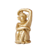 Ornement singe assis en polystone doré