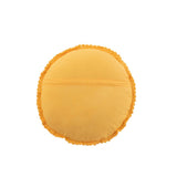 Gros plan du coussin rond Mia Kant montrant la texture en coton.