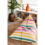 Ambiance cosy avec le coussin Cocoon dans un décor intérieur