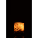 Photophore sur boules en verre vert, parfait pour une ambiance cosy.
